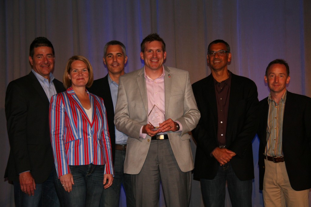 Jason Rhode receiving Blackboard Catalyst Exemplary Course Award